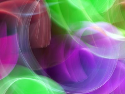 Abstract light trails suggesting fluid motion.